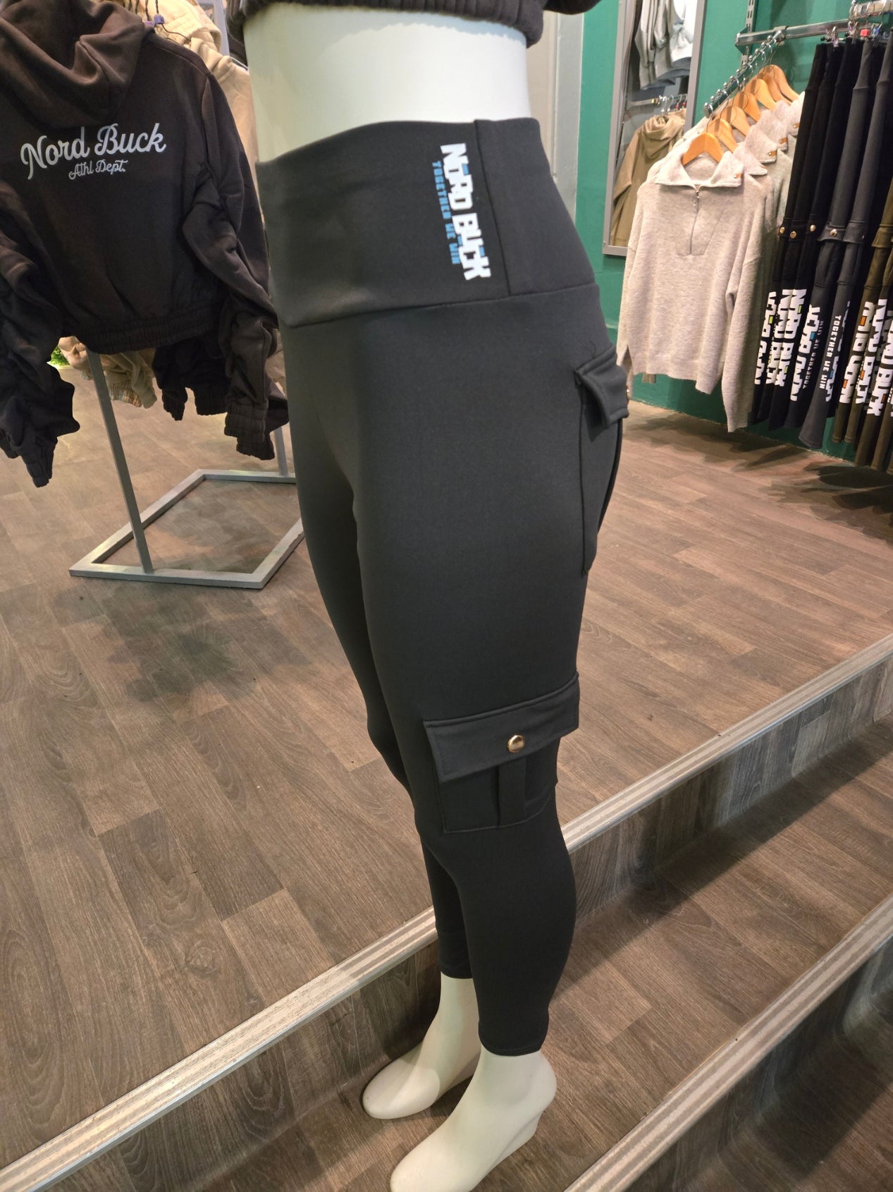 Grey Leggings in a store setting 