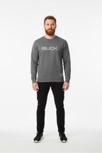 Man wearing a gray sweatshirt with 'Buck' logo on a white background
