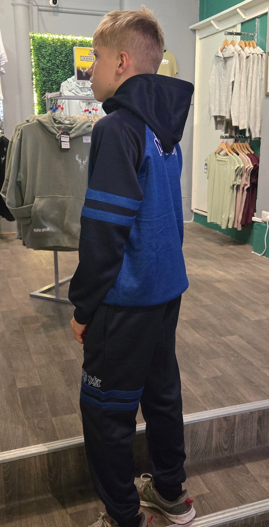 Teenager wearing Blue Nord Buck Tracksuit