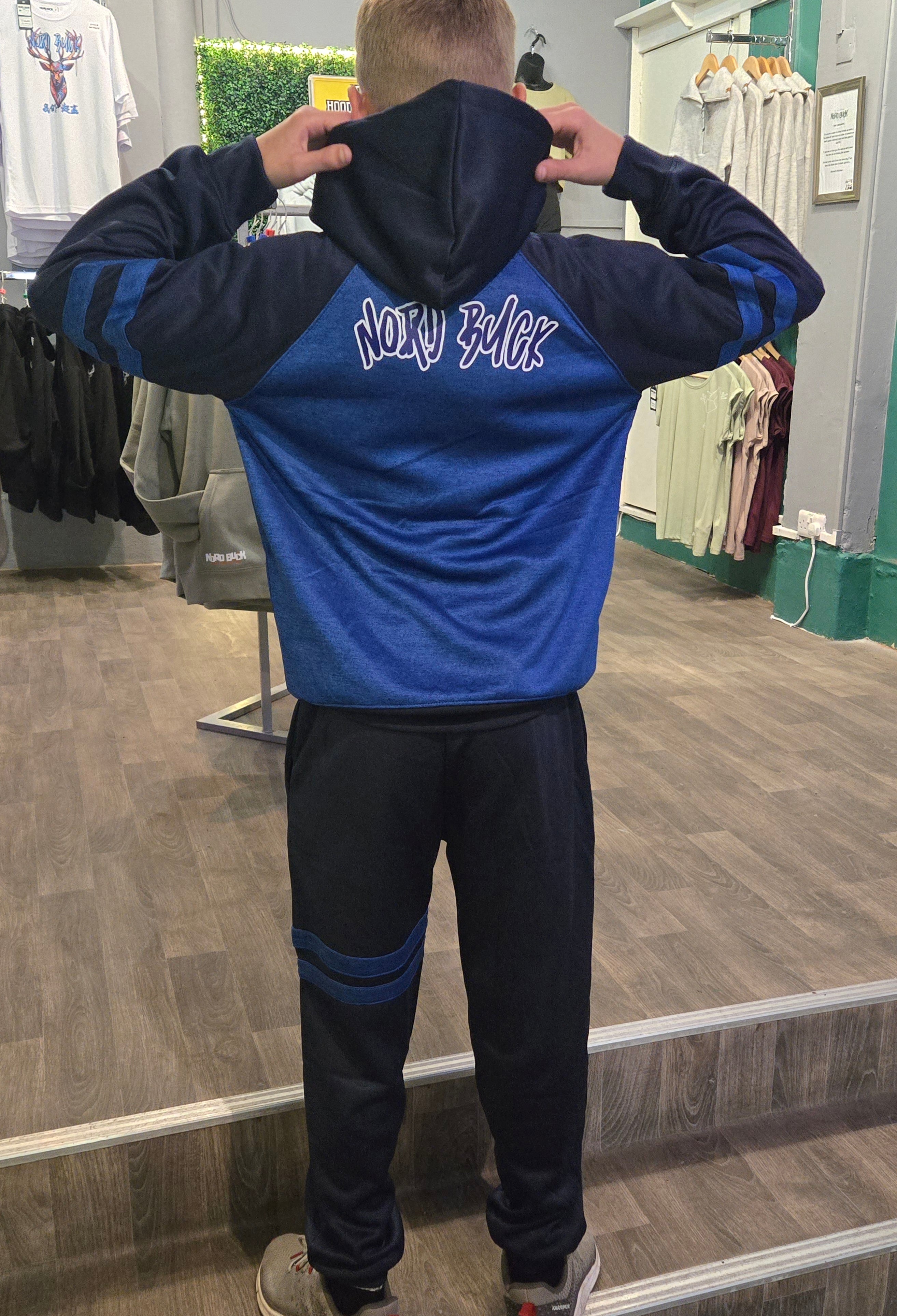 Teenager wearing Blue Nord Buck Tracksuit