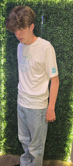older teenager wearing white tshirt with bear print on and Nord Buck logo on arm