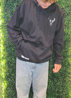 Older teenager wearing navy blue hoodie from Nord Buck with stag logo on the chest 