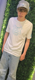 older teenager wearing white tshirt with bear print on and Nord Buck logo on arm