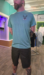 Man wearing light blue sports tshirt